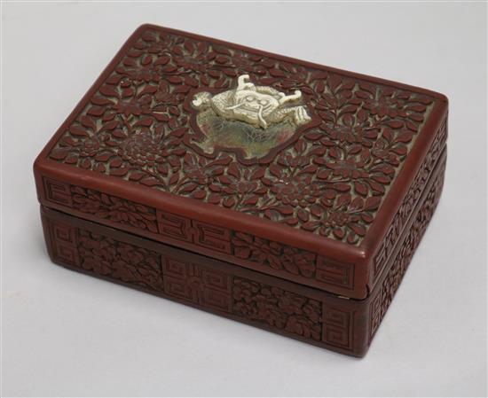 A Chinese red lacquer box and cover